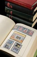 Worldwide Estate Balance Lot. 
Five "Americana" albums containing foreign mint n.h. sets & S/S showing famous US politicians, e