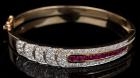 Sparkling Sophistication: Art Deco Style 14K Yellow Gold, Diamond and Ruby Hinged Bangle Bracelet