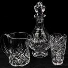Four Waterford Crystal Pieces: Decanter, Cigar Ashtray, Water Pitcher and Glass